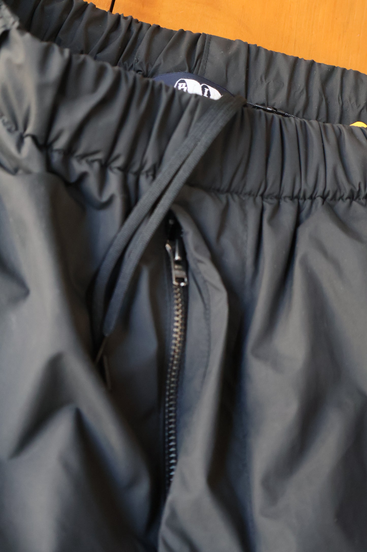 [ BLINK ] LINED NYLON TROUSERS